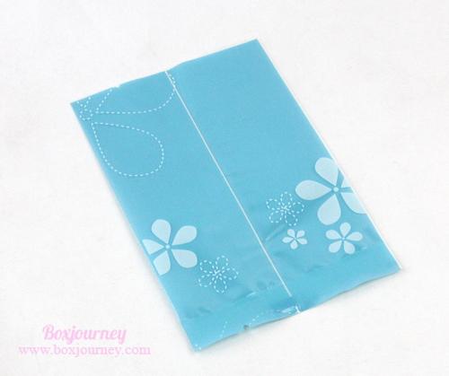 ถุงขนมซีลสีฟ้าลายดอกไม้ 8.5x12.5 cm.