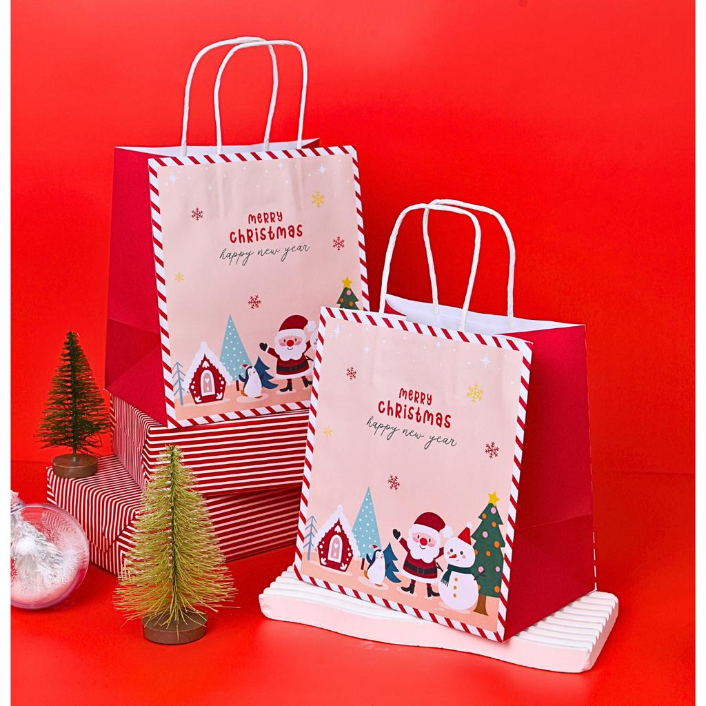 Paper bag with handles, Happy santa pattern, 19x13x21 cm.