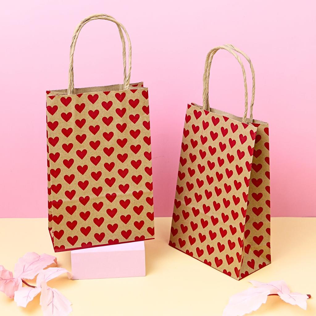 Brown kraft twisted handle paper bag Small red heart print 14x7X21.50 cm.