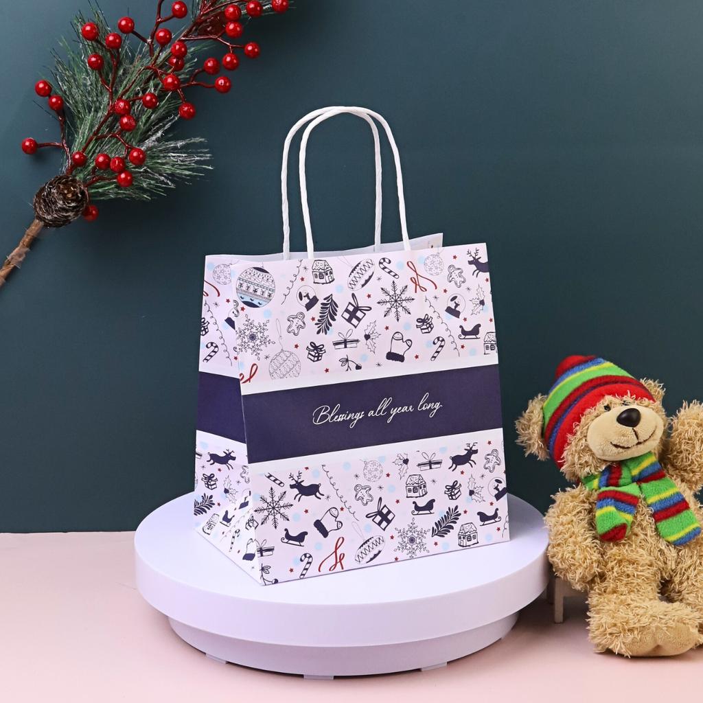 ถุงกระดาษหูเกลียว พิมพ์ลาย ลาย SnowPop 19x13x21 ซม.