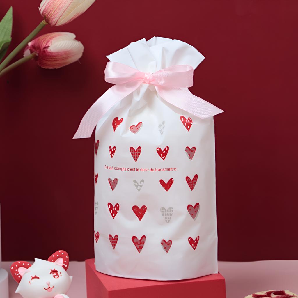 ถุงของขวัญ พร้อมโบว์ ลายหัวใจสีชมพู 01 ขนาด 15x6x23 ซม.