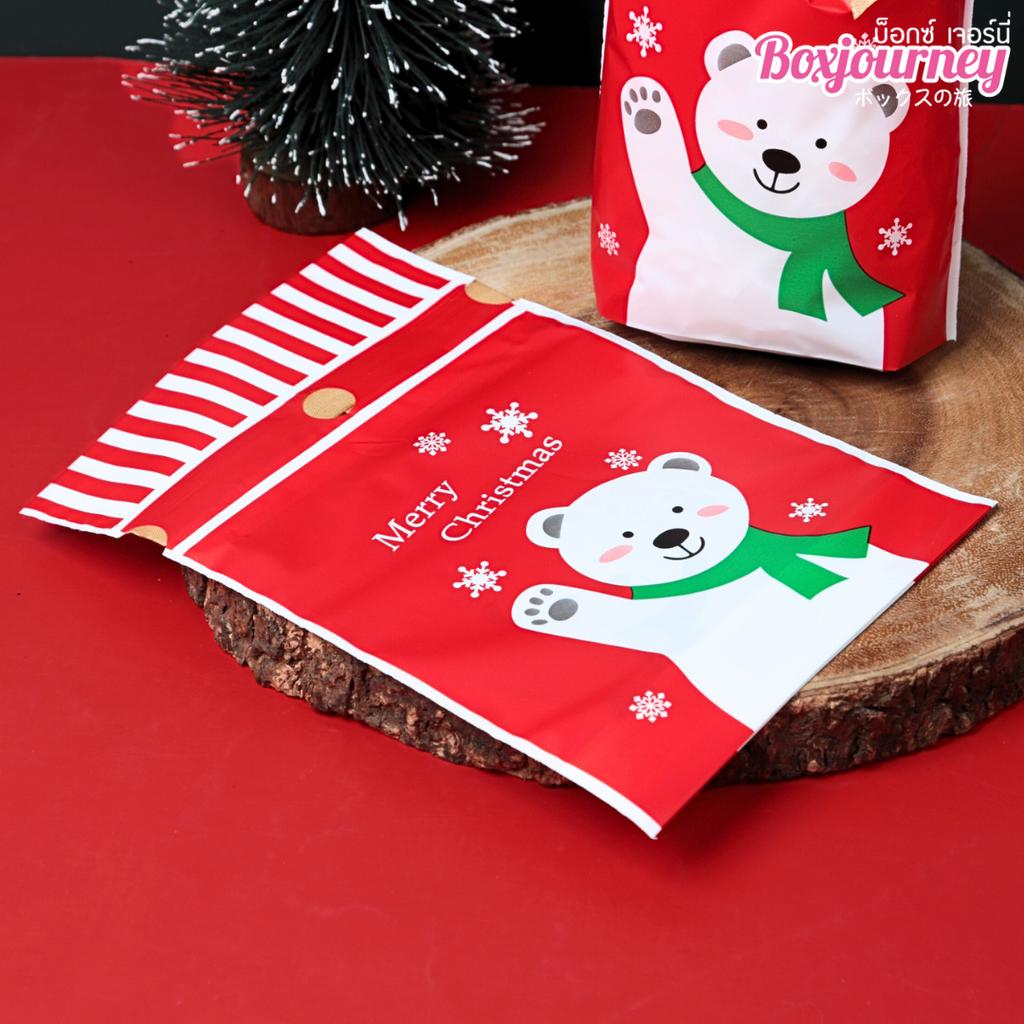 ถุงของขวัญ พร้อมโบว์ ลายคริสต์มาส คละลาย ขนาด 15x6x23 ซม.
