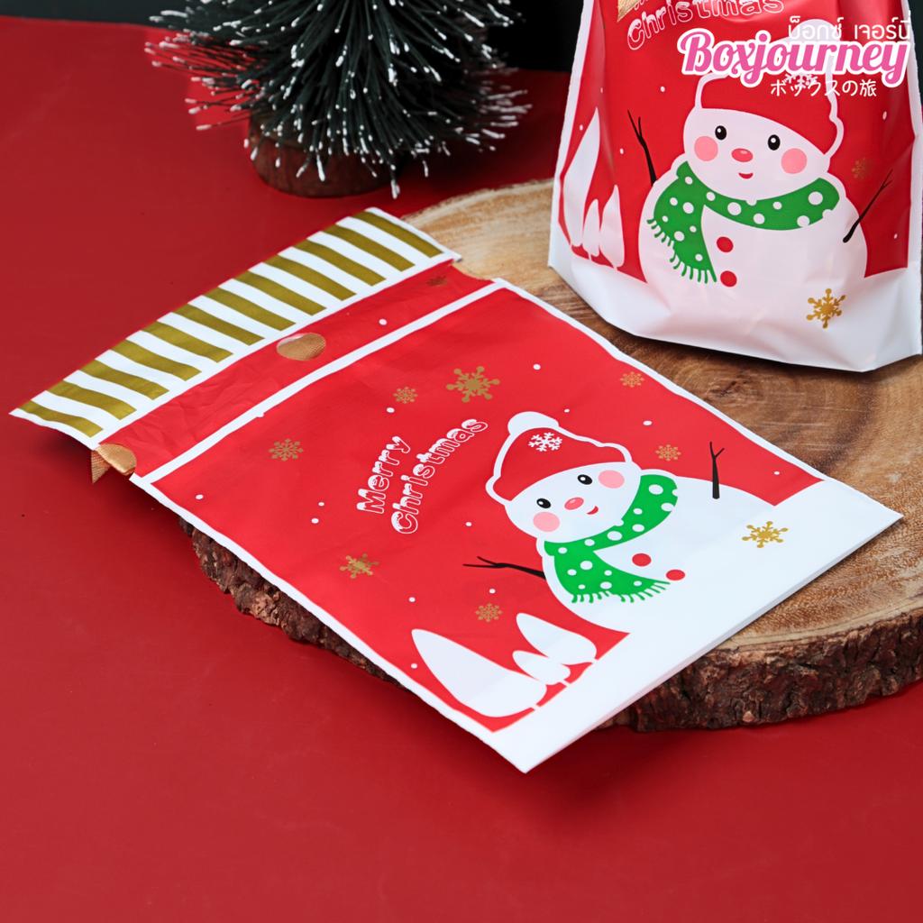 ถุงของขวัญ พร้อมโบว์ ลายคริสต์มาส คละลาย ขนาด 15x6x23 ซม.