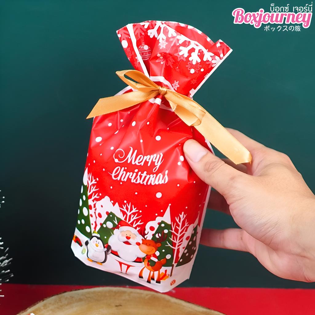 ถุงของขวัญ พร้อมโบว์ ลายคริสต์มาส 01 ขนาด 15x6x23 ซม.
