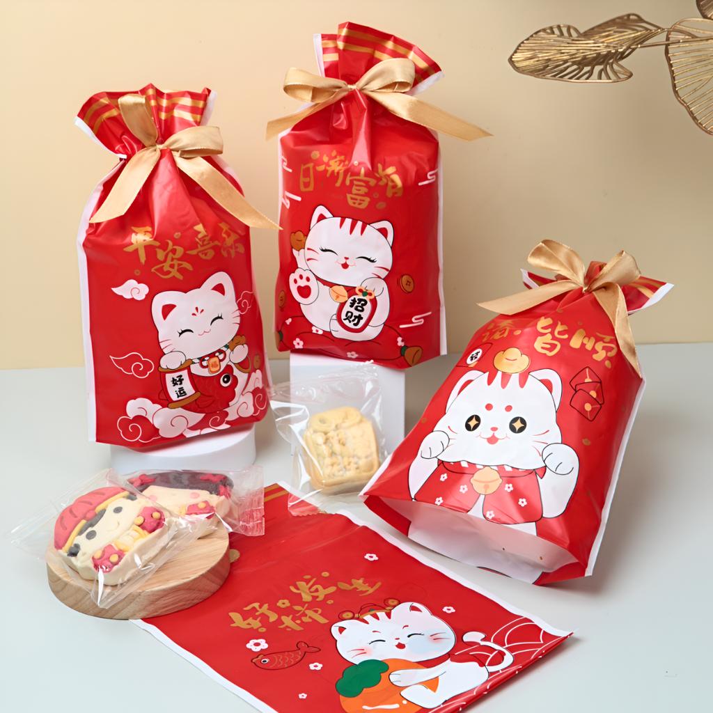 ถุงของขวัญ พร้อมโบว์ ลายแมวตรุษจีน คละลาย ขนาด 15x6x23 ซม.