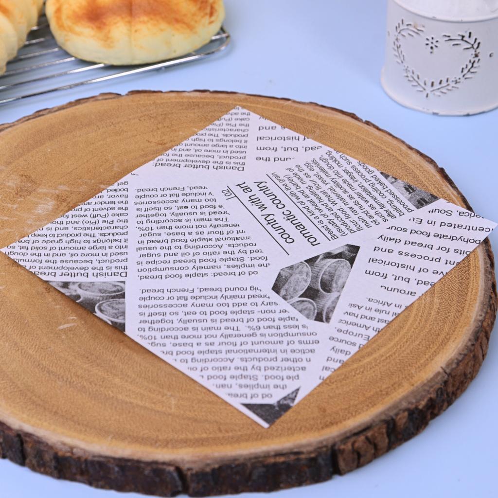 กระดาษรองอาหาร ลายหนังสือพิมพ์สีดำ 6x6 นิ้ว (กันซึม)