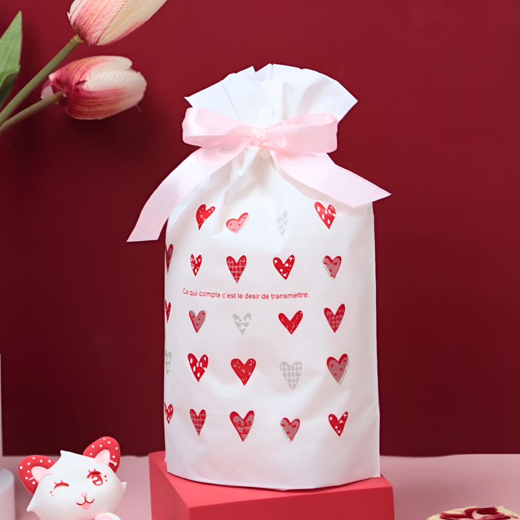 ถุงของขวัญ พร้อมโบว์ ลายหัวใจสีชมพู 01 ขนาด 15x6x23 ซม.