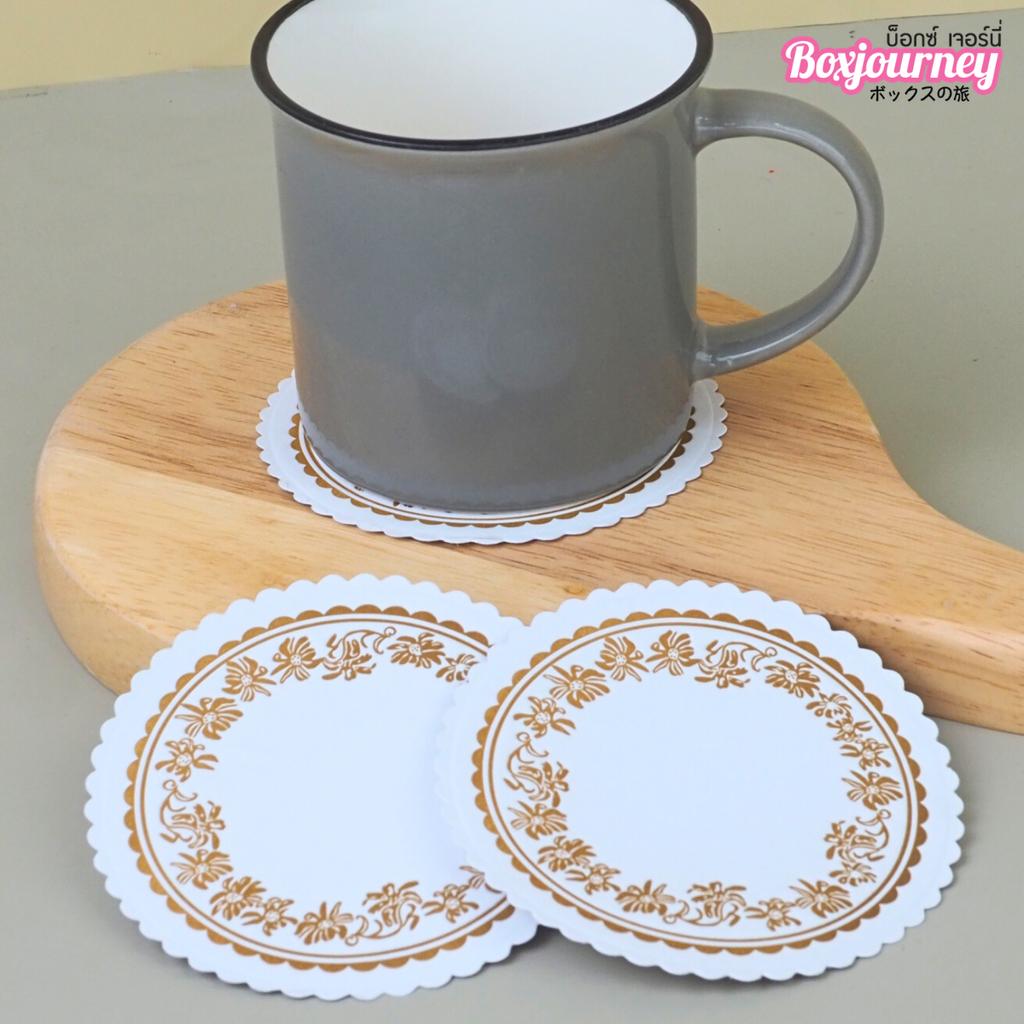 กระดาษรองแก้ว แบบกลม สีขาว ลายดอกไม้สีส้ม