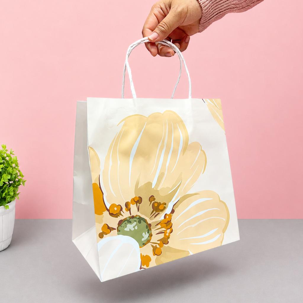 ถุงกระดาษหูเกลียว พิมพ์ลาย ลายSoft Petal Glow 23x15x23 ซม.