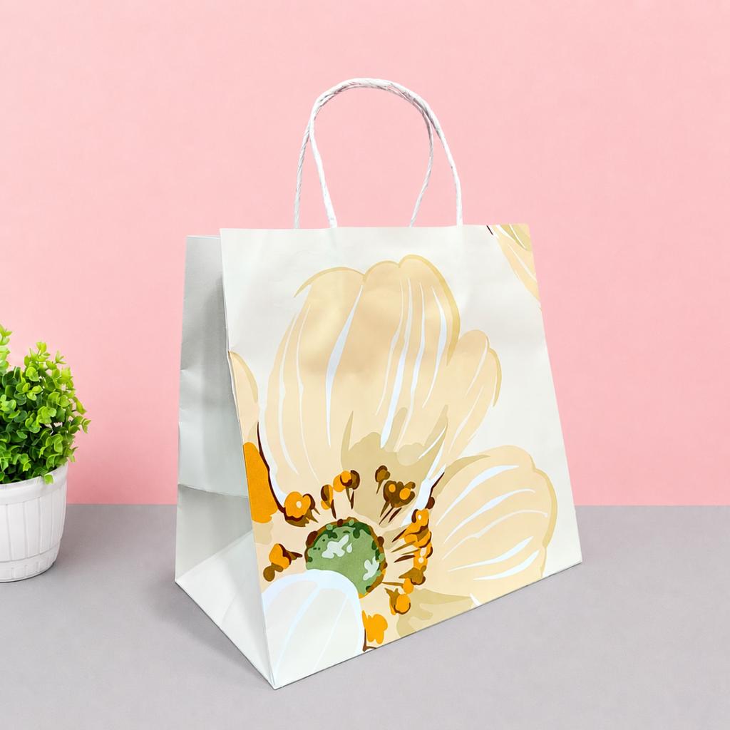 ถุงกระดาษหูเกลียว พิมพ์ลาย ลายSoft Petal Glow 23x15x23 ซม.
